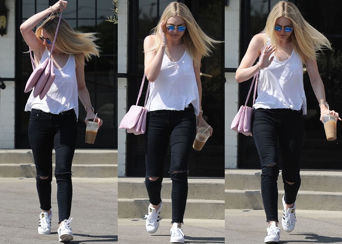 Dakota Fanning wore her casual ensemble with her Adidas Originals 'Superstar' sneakers and a pink Céline 'Trio' crossbody bag